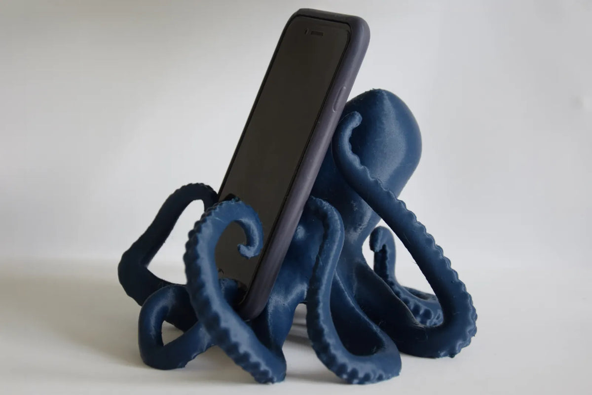 Polvo Escultura e Suporte de Telemóvel