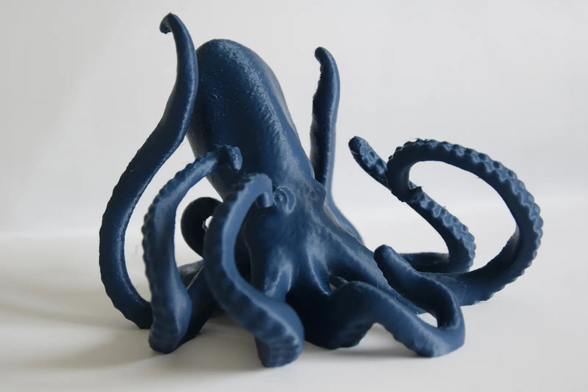Polvo Escultura e Suporte de Telemóvel