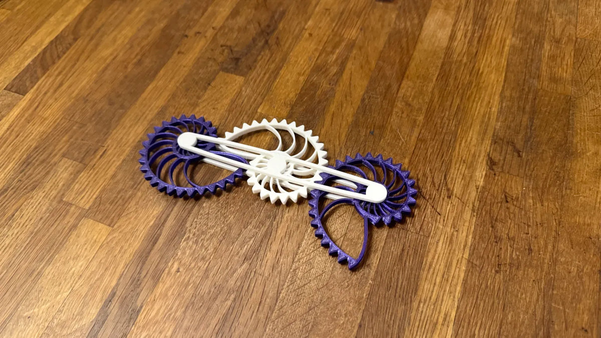 Fidget Engrenagem Tripla Nautilus